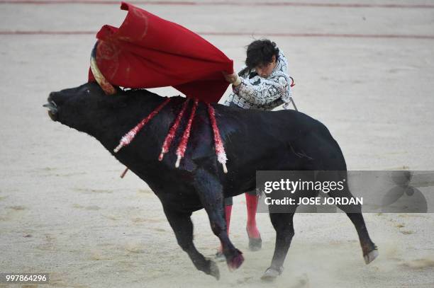 Spanish matador Andres Roca Rey performs a pass on a Jandilla fighting bull during a bullfight of the San Fermin festival in Pamplona, northern Spain...