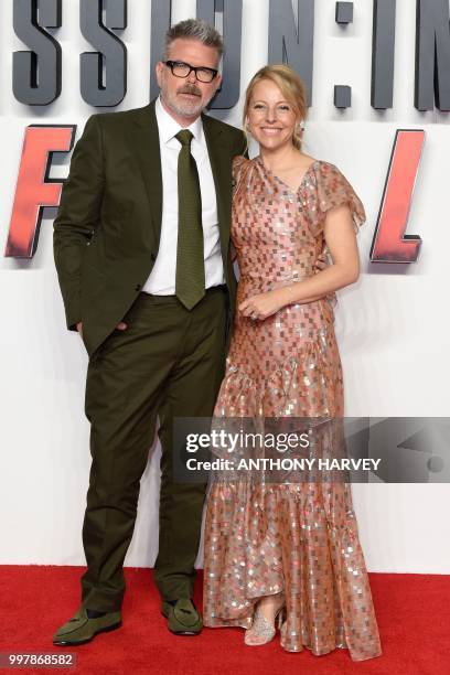 Filmmaker Christopher McQuarrie and his wife Heather arrive for the UK premiere of the film Mission: Impossible - Fallout in London on July 13, 2018.