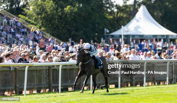 Alpha Centauri ridden by Colm O'Donoghue wins The Tattersalls Falmouth Stakes during day two of The Moet & Chandon July Festival at Newmarket...