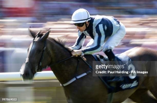 Alpha Centauri ridden by Colm O'Donoghue wins The Tattersalls Falmouth Stakes during day two of The Moet & Chandon July Festival at Newmarket...