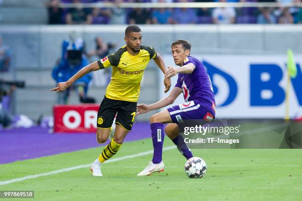 Jeremy Toljan of Dortmund and Uros Matic of Austria Wien battle for the ball during the friendly match between Austria Wien and Borussia Dortmund at...