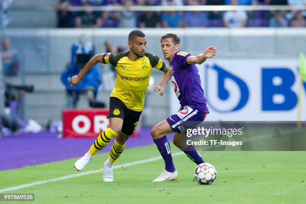 Jeremy Toljan of Dortmund and Uros Matic of Austria Wien battle for the ball during the friendly match between Austria Wien and Borussia Dortmund at...