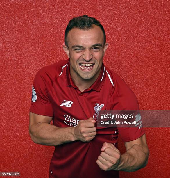 Xherdan Shaqiri signs for Liverpool at Melwood Training Ground on July 13, 2018 in Liverpool, England.