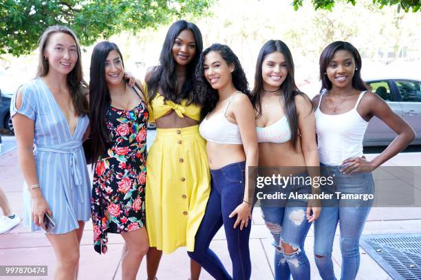 Sports Illustrated Model Jasmyn Wilkins poses with potential models in line during the 2018 Sports Illustrated Swimsuit Casting Call at PARAISO...