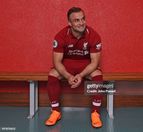 Xherdan Shaqiri signs for Liverpool at Melwood Training Ground on July 13, 2018 in Liverpool, England.