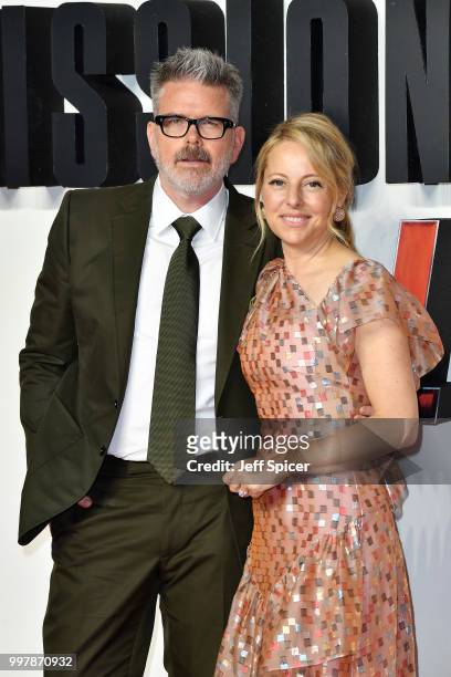 Director Christopher McQuarrie and his wife Heather McQuarrie attend the UK Premiere of "Mission: Impossible - Fallout" at BFI IMAX on July 13, 2018...