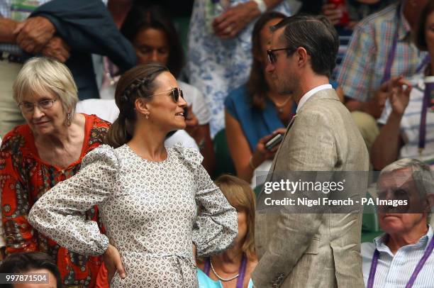 Pippa and James Matthews on centre court on day eleven of the Wimbledon Championships at the All England Lawn Tennis and Croquet Club, Wimbledon.