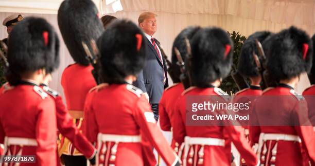 President Donald Trump inspects a Guard of Honour, formed of the Coldstream Guards at Windsor Castle on July 13, 2018 in Windsor, England. Her...