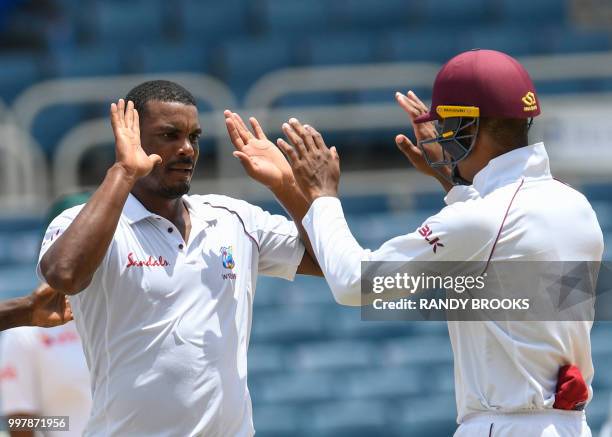 Shannon Gabriel of West Indies celebrates the dismissal of Mominul Haque of Bangladesh during day 2 of the 2nd Test between West Indies and...