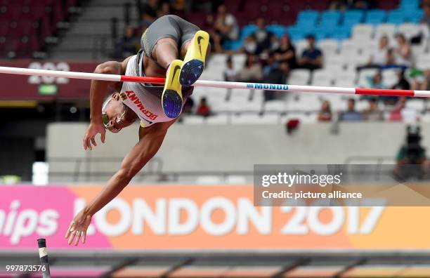 German pole vaulter Raphael Marcel Holzdeppe jumping over the bar at the men's pole vault qualifier at the IAAF World Championships in London, Great...