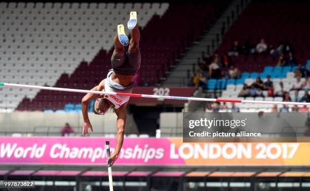 German pole vaulter Raphael Marcel Holzdeppe jumping over the bar at the men's pole vault qualifier at the IAAF World Championships in London, Great...