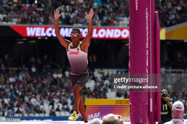 German pole vaulter Raphael Marcel Holzdeppe celebrates his advancing in the men's pole vault qualifier at the IAAF World Championships in London,...