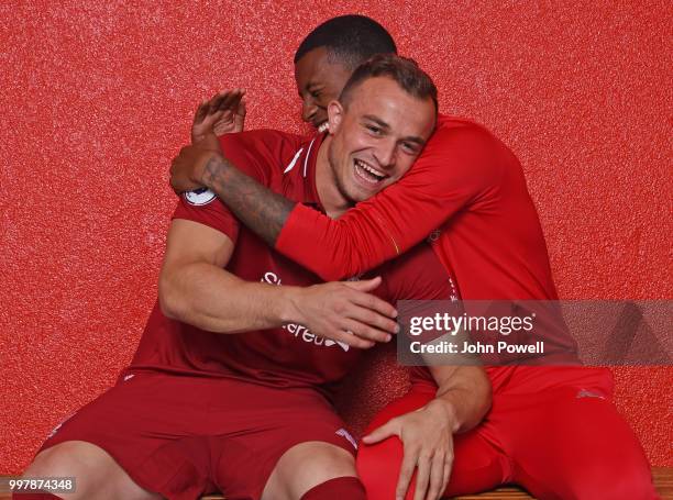 Xherdan Shaqiri with Georginio Wijnaldum of Liverpool before he signs for Liverpool at Melwood Training Ground on July 13, 2018 in Liverpool, England.