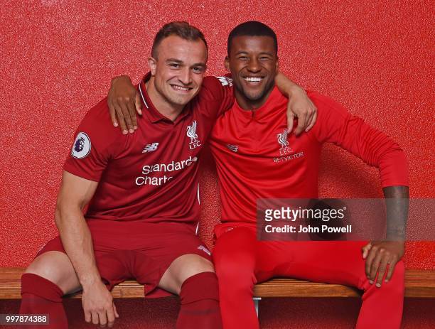 Xherdan Shaqiri with Georginio Wijnaldum of Liverpool before he signs for Liverpool at Melwood Training Ground on July 13, 2018 in Liverpool, England.