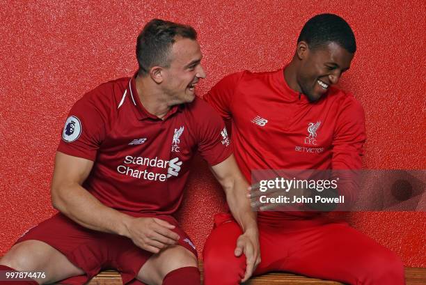 Xherdan Shaqiri with Georginio Wijnaldum of Liverpool before he signs for Liverpool at Melwood Training Ground on July 13, 2018 in Liverpool, England.