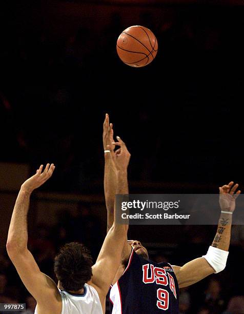 Matias Pellettieri of Argentina and Kenyon Martin of USA compete for the ball during the USA v Argentina Final in the Mens Basketball held at the...