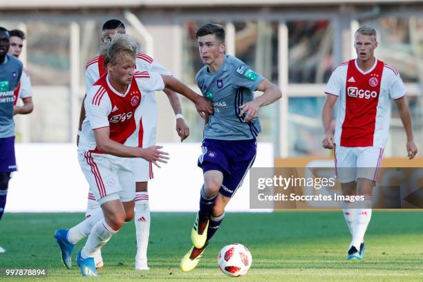 Kasper Dolberg of Ajax, Yevhenii Makarenko of Anderlecht during the Club Friendly match between Ajax v Anderlecht at the Olympisch Stadion on July...