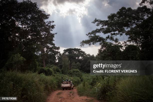 Tanzanian soldiers from the UN peacekeeping mission in the Central African Republic , patrol the town of Gamboula, threatened by the Siriri group, on...