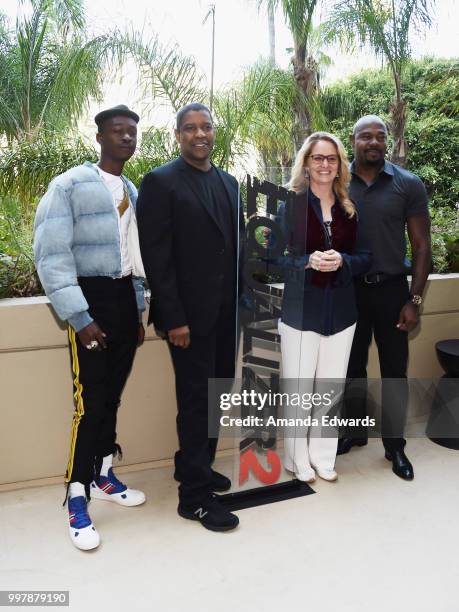 Actors Ashton Sanders, Denzel Washington and Melissa Leo and director Antoine Fuqua attend the photo call for Columbia Pictures' "The Equalizer 2" on...