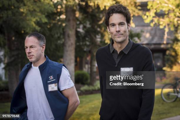 Devin Wenig, president and chief executive officer of eBay Inc., left, and Philipp Schindler, senior vice president & chief business officer at...