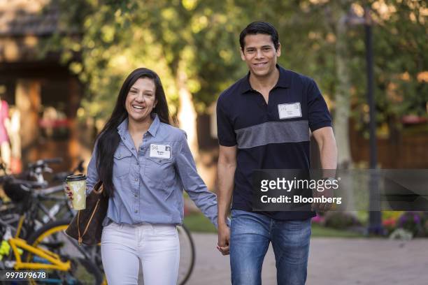 Nirav Tolia, co-founder and chief executive officer of Nextdoor.com Inc., right, arrives for a morning session at the Allen & Co. Media and...