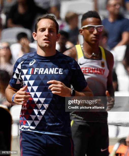 Pole vaulters Renaud Lavillenie and Raphael Marcel Holzdeppe of Germany in qualifying at the IAAF World Championships in Athletics at the Olympic...