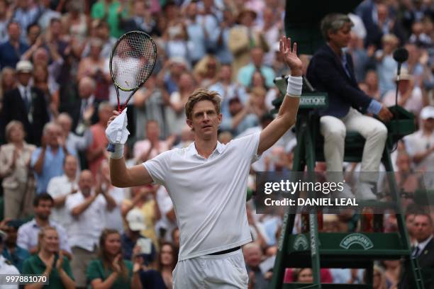 South Africa's Kevin Anderson reacts after winning against US player John Isner during the final set tie-break of their men's singles semi-final...