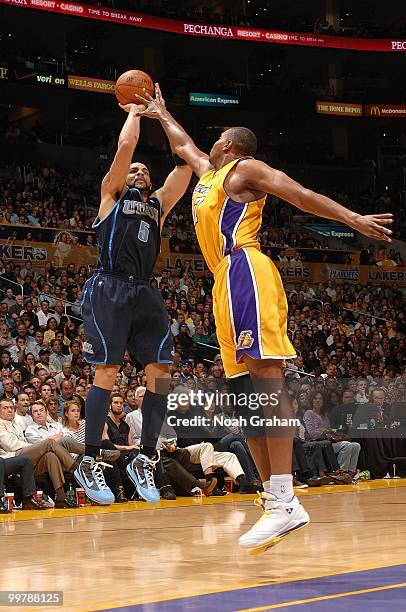 Carlos Boozer of the Utah Jazz shoots over Andrew Bynum of the Los Angeles Lakers in Game Two of the Western Conference Semifinals during the 2010...