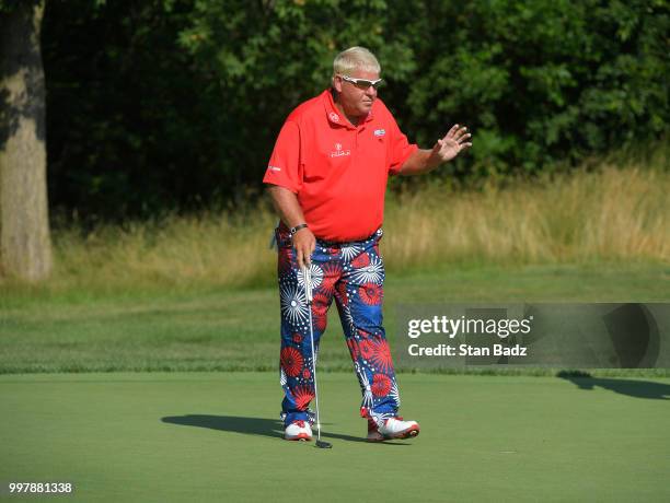 John Daly acknowledges the gallery on the second hole during the second round of the PGA TOUR Champions Constellation SENIOR PLAYERS Championship at...