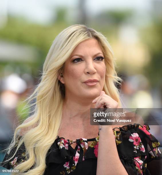 Tori Spelling visits "Extra" at Universal Studios Hollywood on July 13, 2018 in Universal City, California.