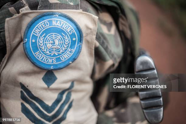 Soldier of Tanzanian contingent from the UN peacekeeping mission in the Central African Republic patrols the town of Gamboula, threatened by the...