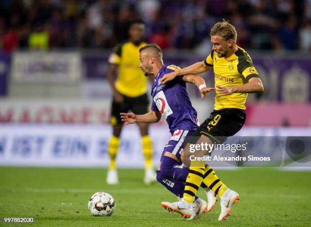 Marcel Schmelzer of Borussia Dortmund in action during a friendly match against Austria Wien at the Generali Arena on July 13, 2018 in Vienna,...