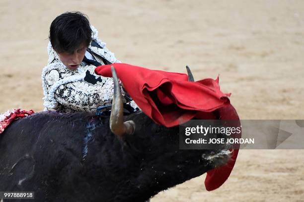 Spanish matador Andres Roca Rey performs a pass on a Jandilla fighting bull during a bullfight of the San Fermin festival in Pamplona, northern Spain...