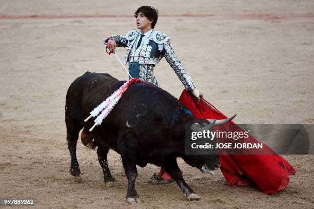 Spanish matador Andres Roca Rey performs a pass on a Jandilla fighting bull during a bullfight of the San Fermin festival in Pamplona, northern Spain...