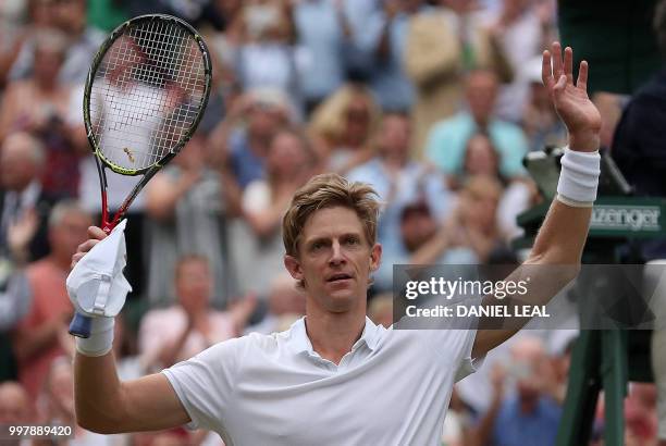 South Africa's Kevin Anderson reacts after winning against US player John Isner during the final set tie-break of their men's singles semi-final...