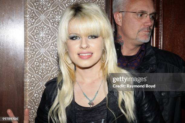 Singer Orianthi poses for photos in the "Universal Music Suite" at the Hilton Chicago Hotel in Chicago, Illinois on MAY 16, 2010.