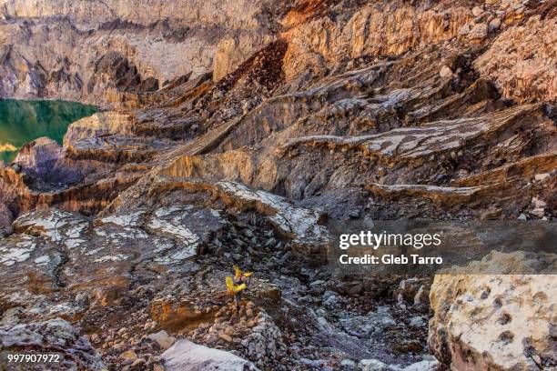 sulfur mining, mount ijen crater lake, indonesia - east java province stock pictures, royalty-free photos & images