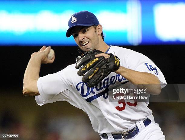 Blake DeWitt of the Los Angeles Dodgers makes a throw to first base for an out against the Colorado Rockies at Dodger Stadium on May 7, 2010 in Los...