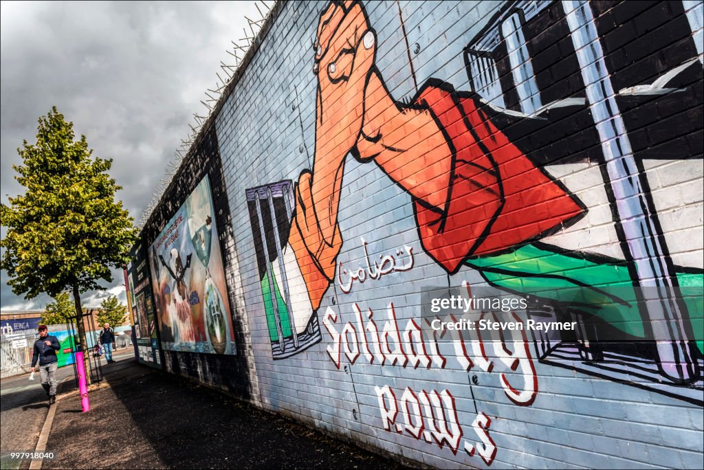 Belfast mural shows solitary between Northern Ireland and Palestinian prisone
