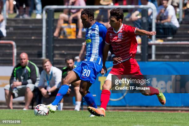 Valentino Lazaro of Hertha BSC and Enes Schick of Westfalia Herne battle for the ball during the TEDi-Cup match between Hertha BSC and Westfalia...