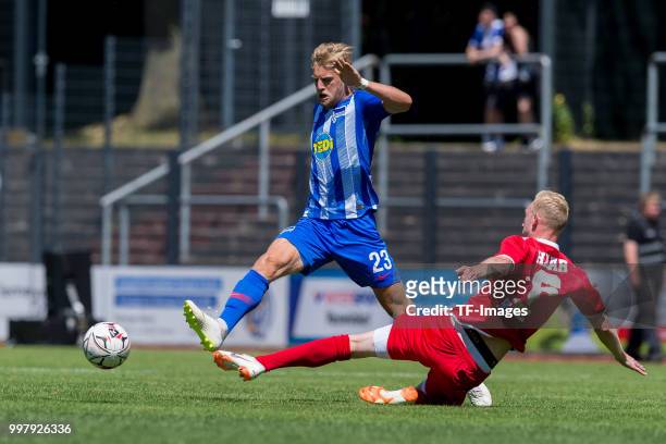Arne Maier of Hertha BSC and Justin Klein of Westfalia Herne battle for the ball during the TEDi-Cup match between Hertha BSC and Westfalia Herne on...