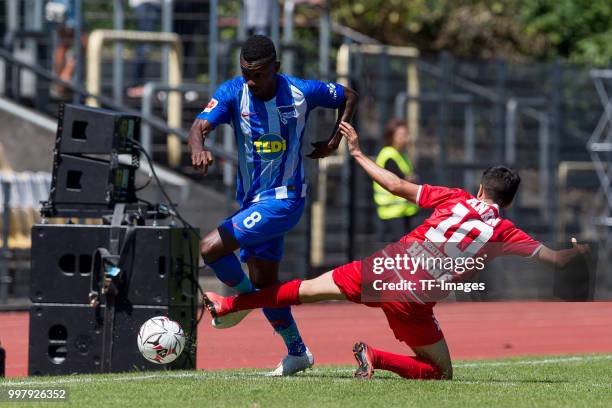 Salomon Kalou of Hertha BSC and Ilias Anan of Westfalia Herne battle for the ball during the TEDi-Cup match between Hertha BSC and Westfalia Herne on...