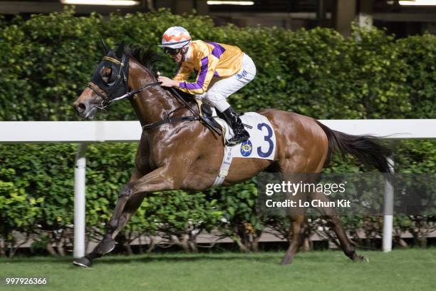 Jockey Zac Purton riding Saul's Special wins the Race 6 Let Me Fight Handicap at Happy Valley Racecourse on July 11, 2018 in Hong Kong.