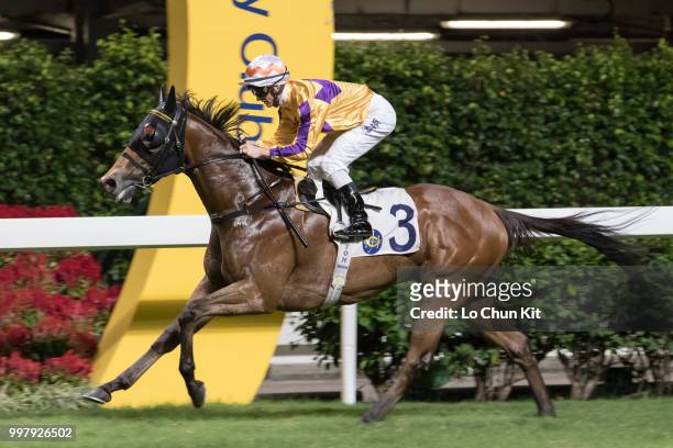 Jockey Zac Purton riding Saul's Special wins the Race 6 Let Me Fight Handicap at Happy Valley Racecourse on July 11, 2018 in Hong Kong.