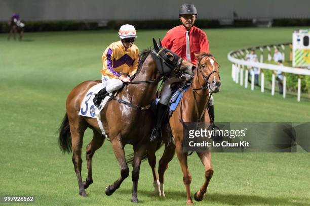 Jockey Zac Purton riding Saul's Special wins the Race 6 Let Me Fight Handicap at Happy Valley Racecourse on July 11, 2018 in Hong Kong.