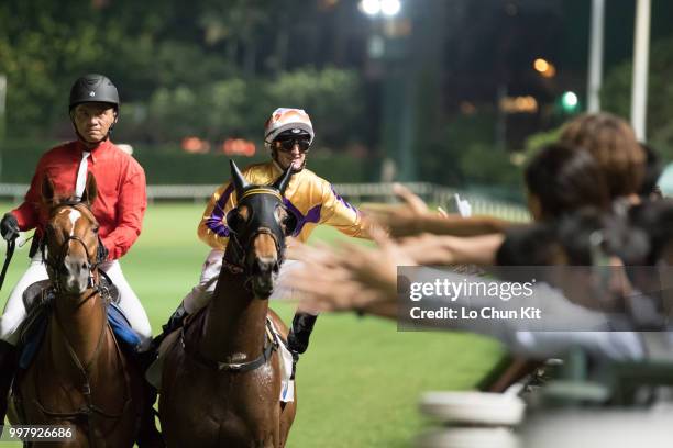 Jockey Zac Purton riding Saul's Special wins the Race 6 Let Me Fight Handicap at Happy Valley Racecourse on July 11, 2018 in Hong Kong.