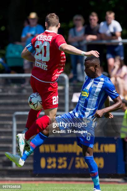 Philipp Roessler of Westfalia Herne and Salomon Kalou of Hertha BSC battle for the ball during the TEDi-Cup match between Hertha BSC and Westfalia...