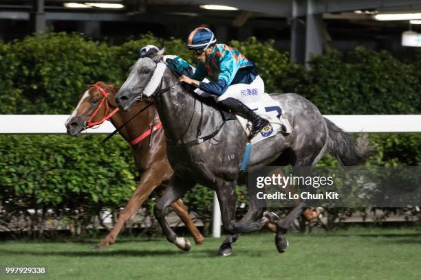 Jockey Vincent Ho Chak-yiu riding Super Turbo wins the Race 7 Sun Jewellery Handicap at Happy Valley Racecourse on July 11, 2018 in Hong Kong.