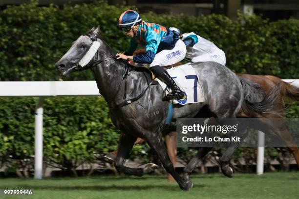 Jockey Vincent Ho Chak-yiu riding Super Turbo wins the Race 7 Sun Jewellery Handicap at Happy Valley Racecourse on July 11, 2018 in Hong Kong.