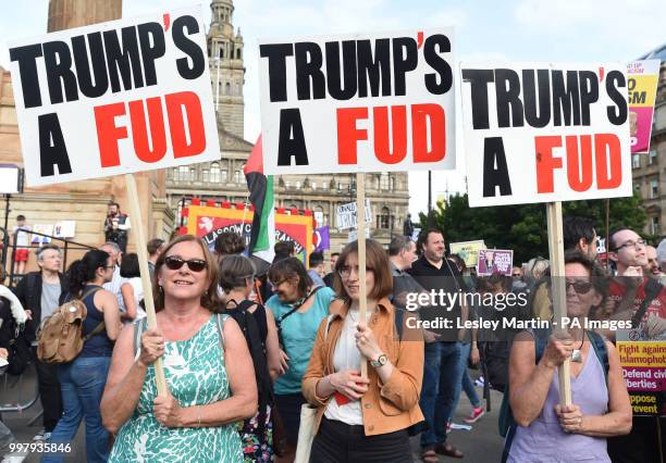 Demonstrators in George Square, Glasgow, for the Scotland United Against Trump protest against the visit of US President Donald Trump to the UK.